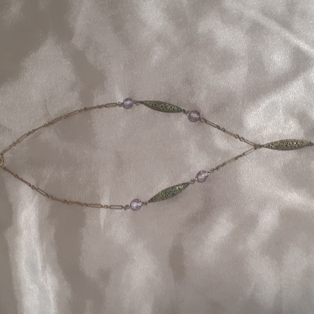 Vintage tarnished brass necklace .